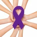 awareness ribbon many hands holding